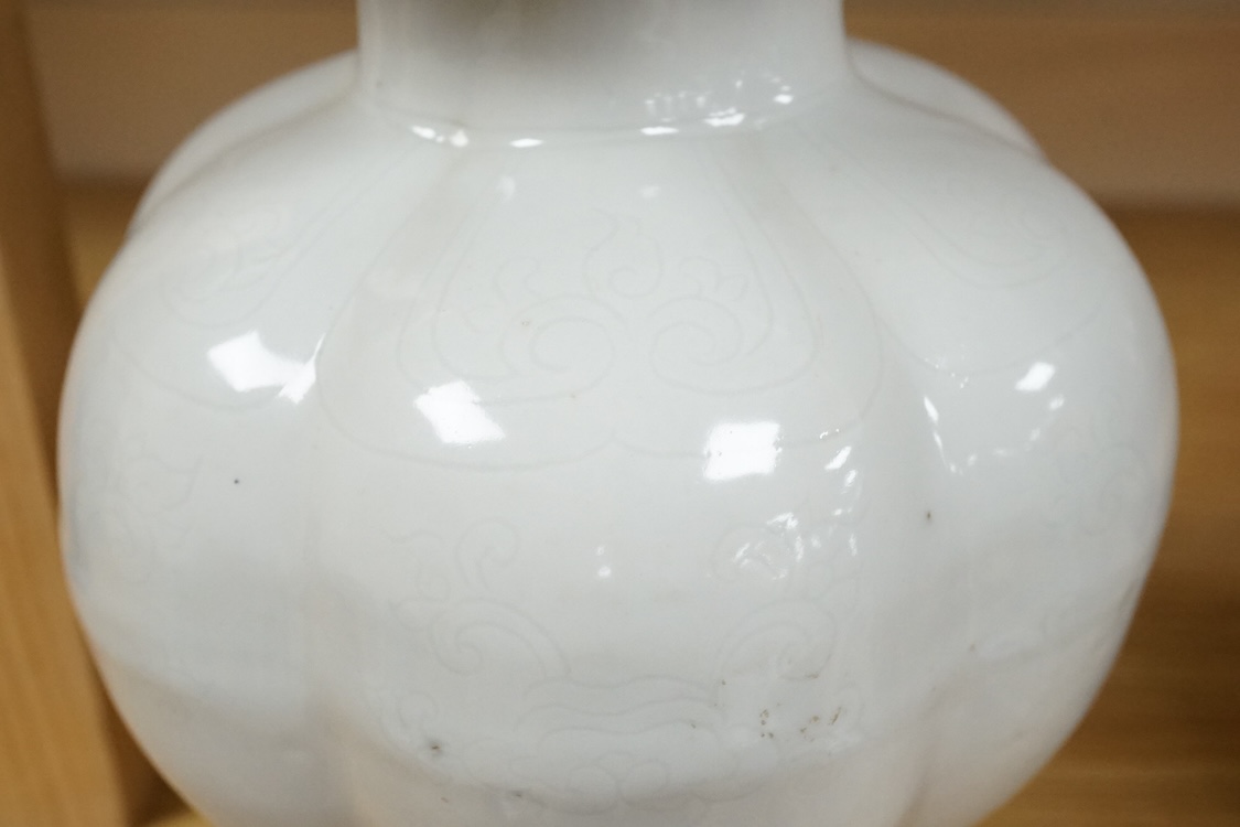 A Chinese anhua decorated vase, 20cm high